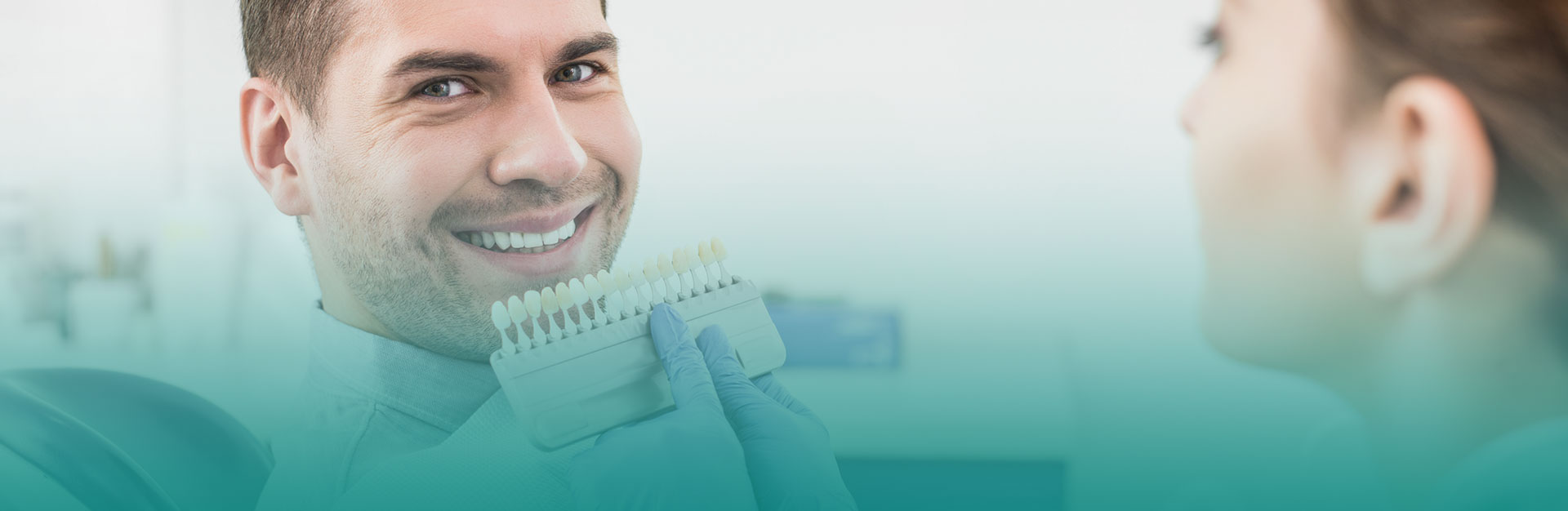 A man is smiling after having dental veneers